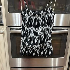 Summer very light weight gathered at the hip a bit.